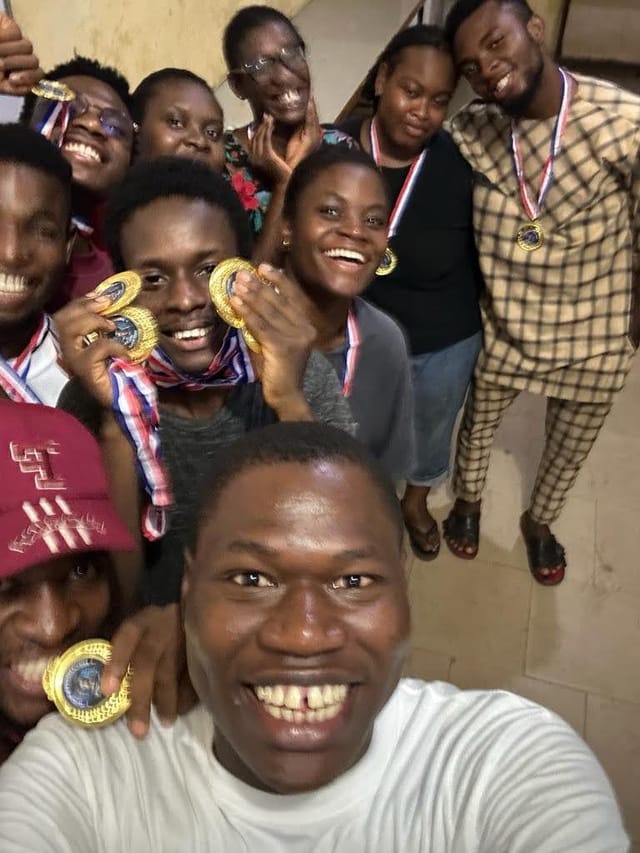 A group selfie of classmates at a social night